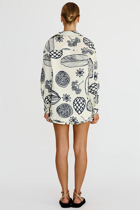 printed two-piece tropical outfit

casual matching lounge sets

women’s summer matching sets

resort wear for women

trendy fruit print clothingtropical fruit print outfit

button down co-ord set

women’s resort set

elastic waist tropical shorts

two piece casual lounge set

relaxed fit vacation outfit

