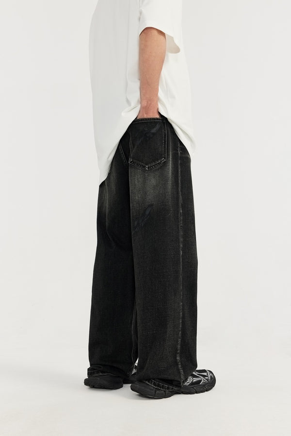 men's wide-leg jeans, black denim jeans, vintage washed jeans, loose-fit jeans, casual streetwear, urban fashion, baggy denim, relaxed fit jeans, trendy men's denim.