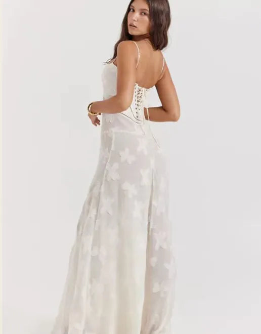 floral maxi dress
embossed maxi dress
formal gown
sleeveless gown
wedding dress
special occasion dress
textured maxi dress floral
sophisticated maxi gown
contemporary formal dress