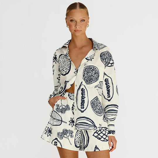 printed two-piece tropical outfit

casual matching lounge sets

women’s summer matching sets

resort wear for women

trendy fruit print clothingtropical fruit print outfit

button down co-ord set

women’s resort set

elastic waist tropical shorts

two piece casual lounge set

relaxed fit vacation outfit


